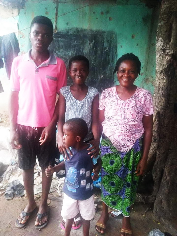 Mother Louisa and her children.  Their house has been marked as one of the first homes to be demolished.  This family has been here a long time. They suffered much, yet they are grateful to God for keeping them alive!