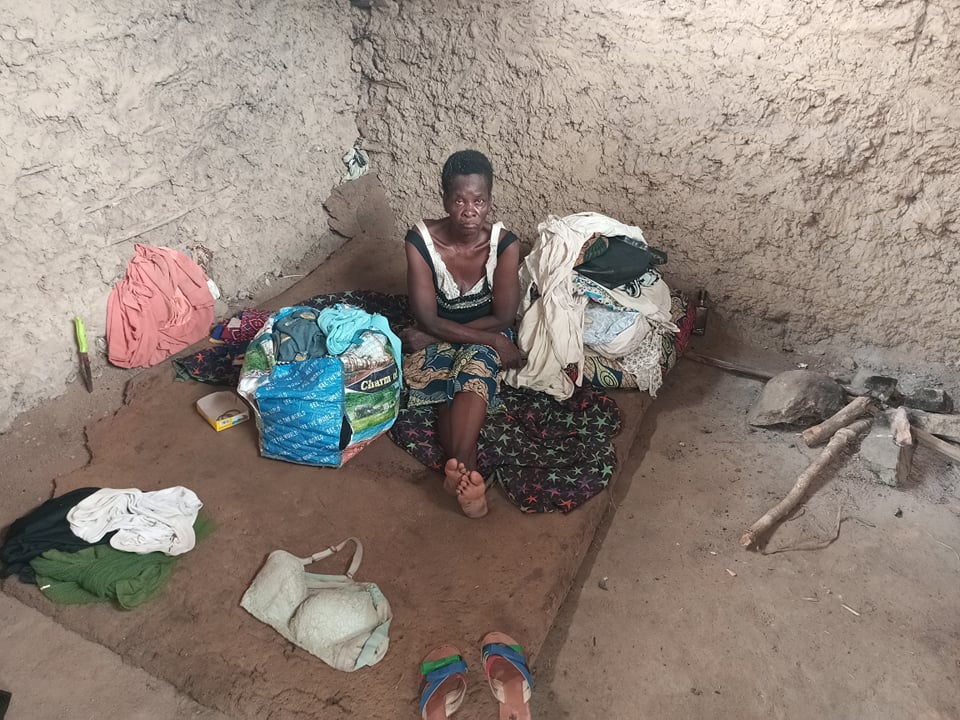 Ma Hawa cooks inside her house. With a porch she will be able to cook outside.