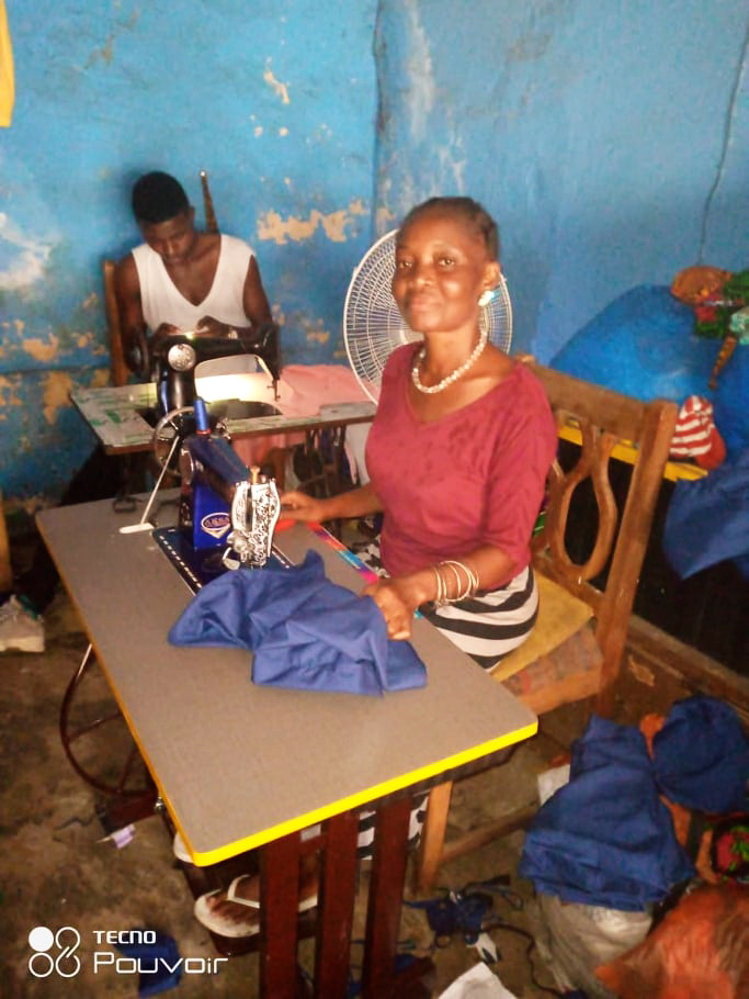Fatu is a good tailor.  She is so grateful for her new machine!