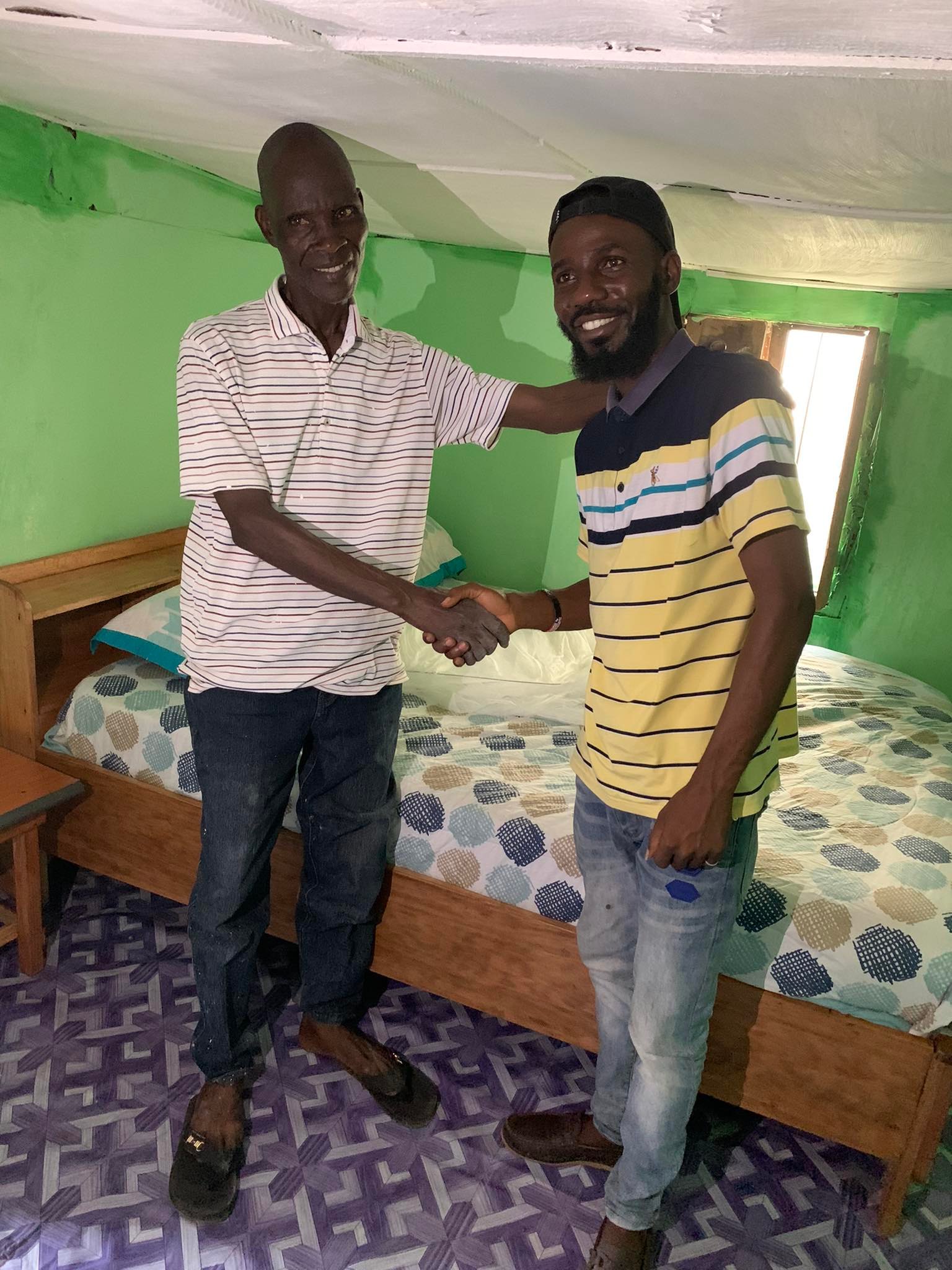 Daniel stands with Harry in his new room. Pa Harry is so very grateful for all Daniel has done for him.  
Thank you to the donor who has made all this possible! What a gift!