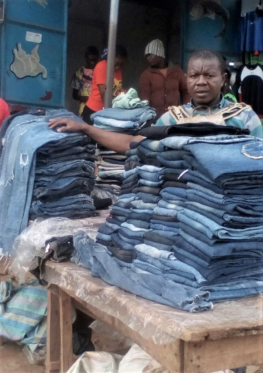 Roger sells jeans to help provide for his family.
