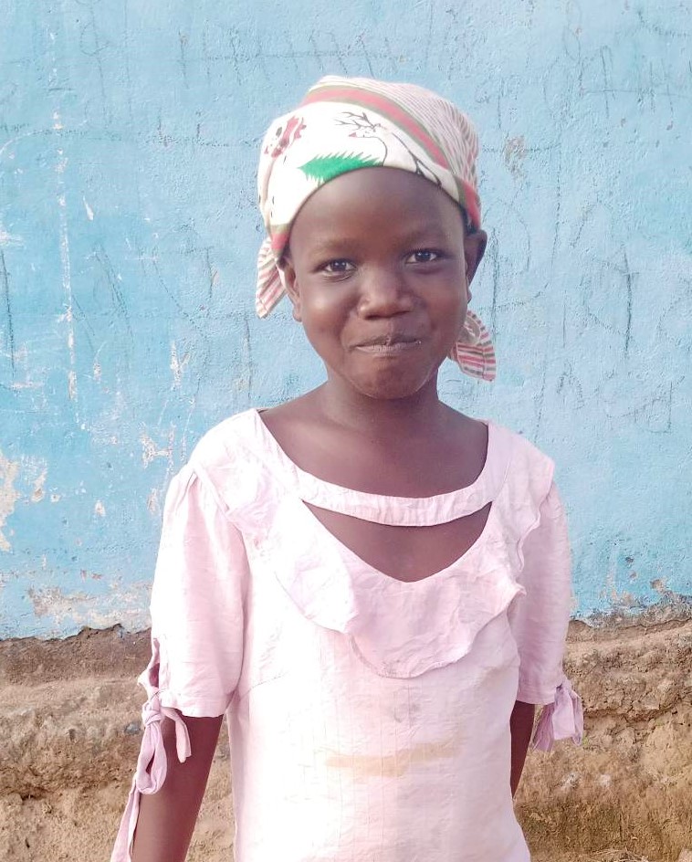 Sharley is 11 years old. She lived with her mother in Bong County where she was attending school.