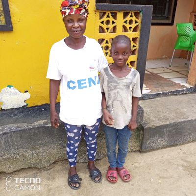 Enoch and his mother, the day they came to our office asking for school fees. Mother Siah is a single mother.