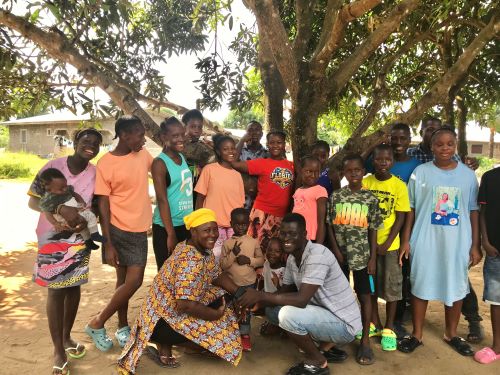 Eric and Kamah have a huge family of 24 kids. We took this photo on our last visit. What a great time we had playing sorry with the kids, eating Kamah's delicious food and listening to the children sing. What a happy home!