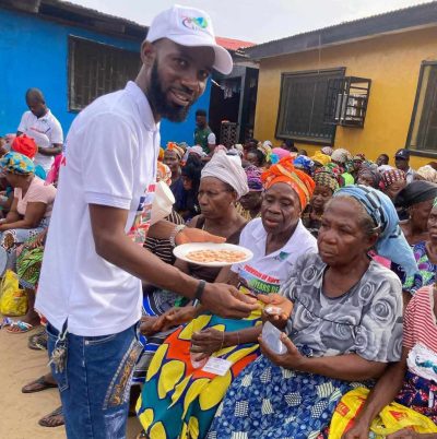 Daniel Coleman Giving out the Worm Medication