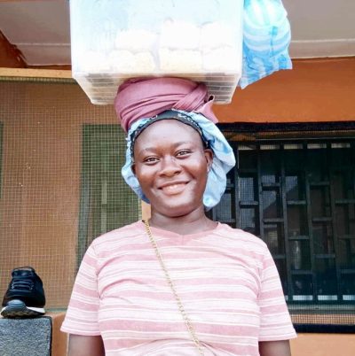 Janet Selling her baking with a plastic container Janet Selling her baking with a plastic container