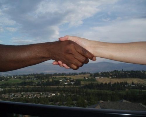 John Duwana and Mama Karen Handshake