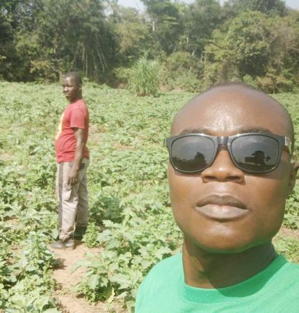 Preston Gonmiah with Fredrick Mensah showing beautiful okra crop
